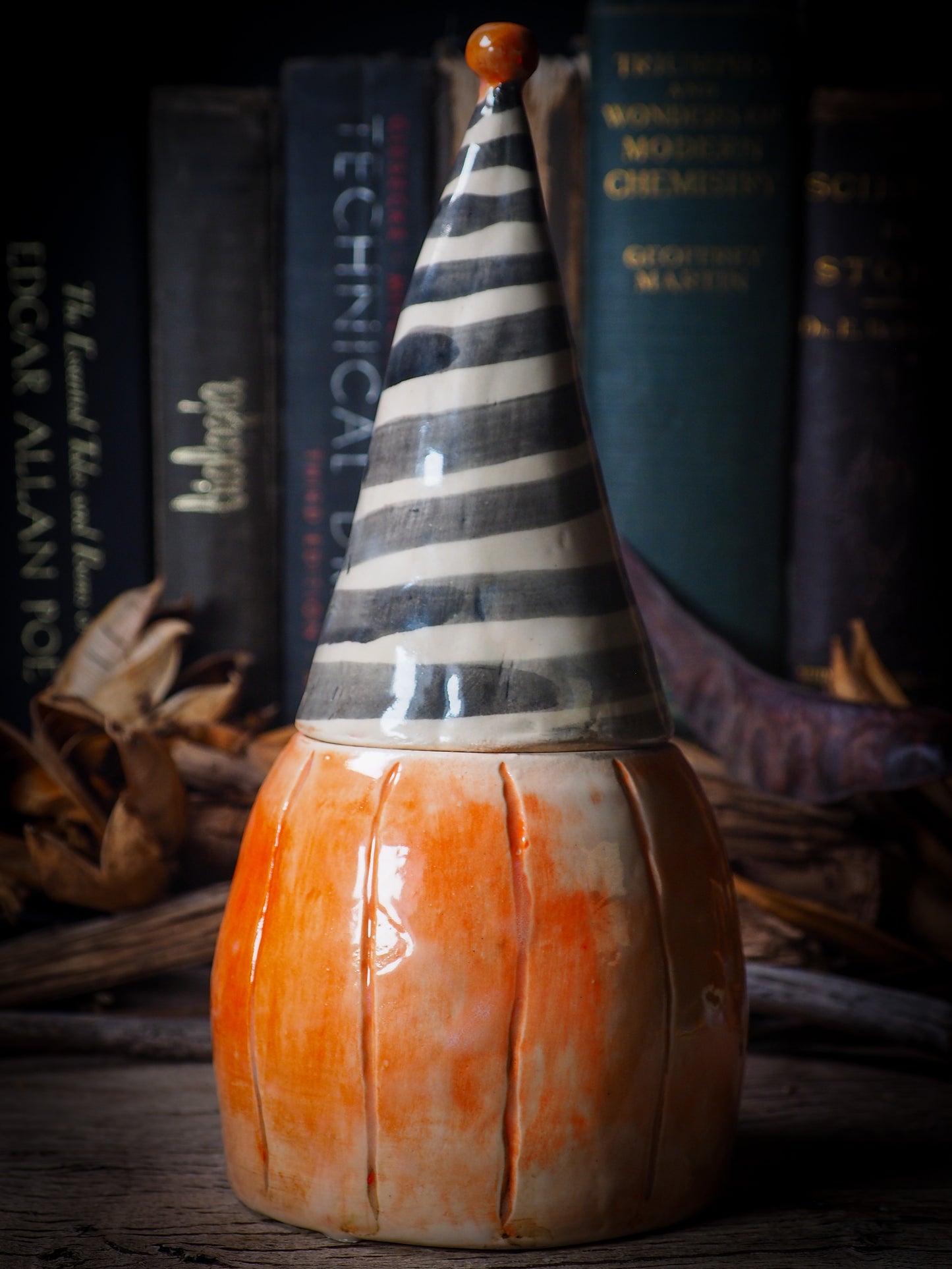 Fire glazed ceramic figurine by Idania Salcido, Danita Art. On Halloween, Danita creates spooky cute hand made ceramic figures to decorate your home in the scariest holiday of the year. Ghosts, witches, ghouls, vampires, black cats, pumpkins, jack-o-lantern and creatures of the night in glazed ceramic home decor.