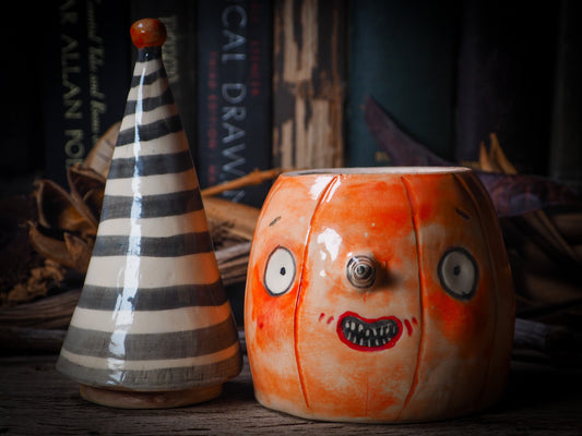 Fire glazed ceramic figurine by Idania Salcido, Danita Art. On Halloween, Danita creates spooky cute hand made ceramic figures to decorate your home in the scariest holiday of the year. Ghosts, witches, ghouls, vampires, black cats, pumpkins, jack-o-lantern and creatures of the night in glazed ceramic home decor.