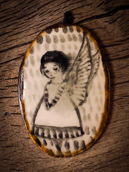 Unique fired ceramic porcelain necklace oval pendant by Idania Salcido, the artist behind Danita Art. Each jewelry setting is hand drawn and illustrated by the artist in her art studio, perfect for any dressing style. A casual gathering with friends or a fancy formal dinner, this necklace is a perfect fashion accessory.