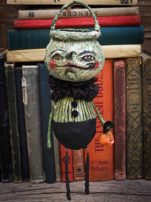 Handmade Halloween ornament posable doll by Danita. It is handmade using spun cotton and paper clay to make a whimsical Halloween home decor decoration