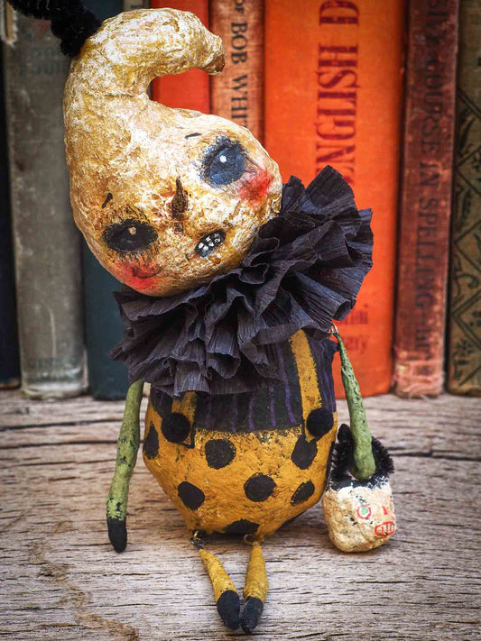 Danita Art thought about the Christmas carol story and decided to make a Halloween version with ghosts, ghouls, pumpkins, jack-o-lanterns, witches, cauldrons and more night creatures. This handmade art doll ornament for Christmas or Halloween trees is made with Spun cotton and paper clay,