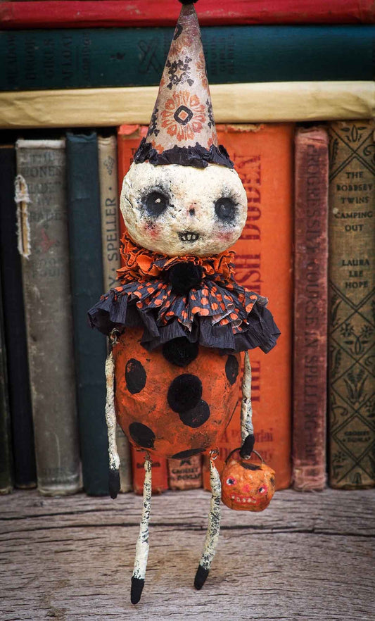 A Halloween carol is Danita's version of the tale of the three ghosts in A Christmas carol. Danita made handmade art dolls in spun cotton using ghouls, jack-o-lanterns, skeleton, witches, ghosts and more to create a visually inspiring set collection of Handmade dolls to create a beautiful Halloween story and home decor decoration.