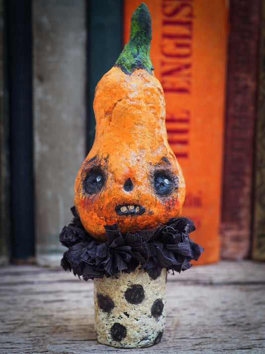 Original Danita Art Kokeshi Art doll for Halloween. An orange pumpkin made with organic 100% natural spun cotton, hand sculpted and painted by Danita. This hand made doll is perfect for Halloween decorations!