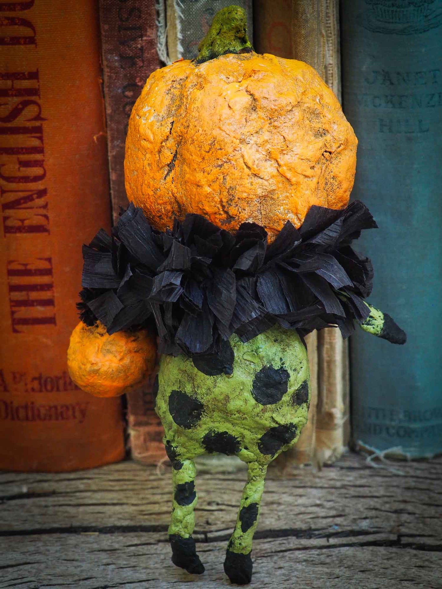 pumpkin jack-o-lantern ornament Halloween decoration. Danita art original handmade art doll pumpkin made with spun cotton from collection of witches, ghosts, skeletons, jack-o-lantern, pumpkin, vampire, ghouls and other whimsical folk art style home decor.