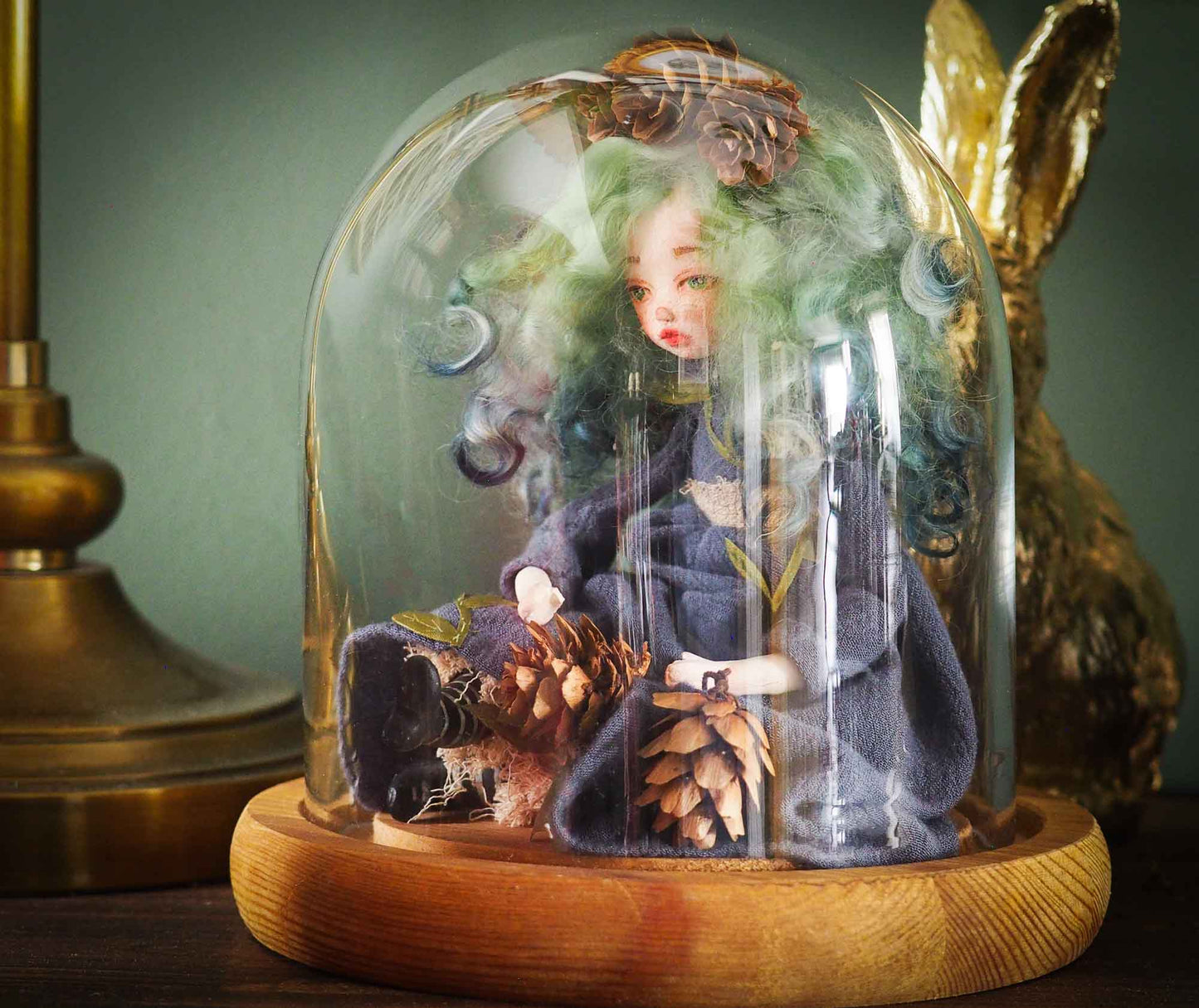 Original Danita Art handamde doll. Gaia mother nature is represented on this handmade figurine with pine cones, leaves and amazing details on her face and eyes. It is a perfect fantasy figurine gift.