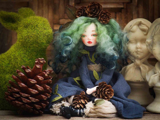 Original Danita Art handamde doll. Gaia mother nature is represented on this handmade figurine with pine cones, leaves and amazing details on her face and eyes. It is a perfect fantasy figurine gift.