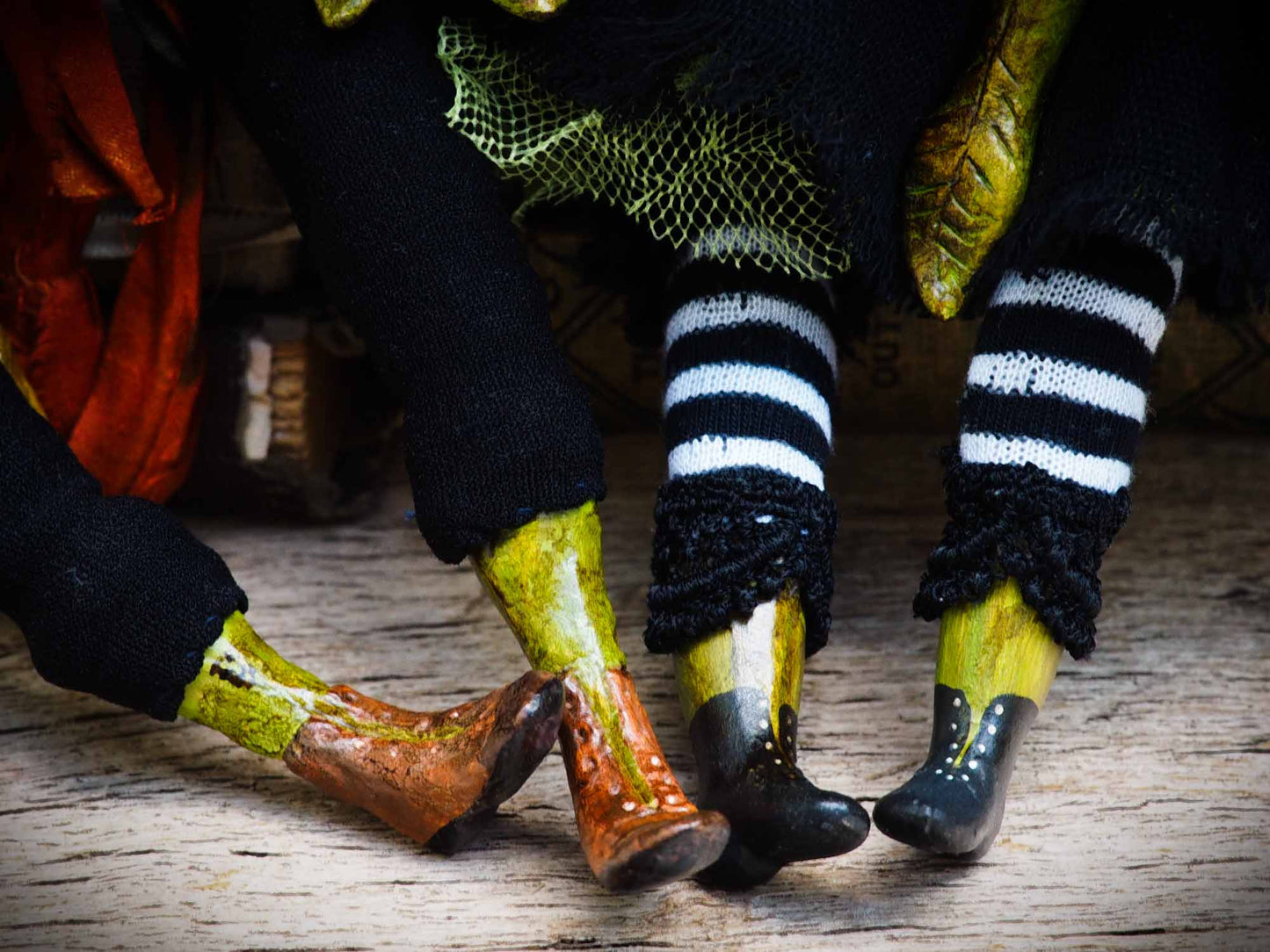 A witch transformed a boy into a Halloween pumpkin monster. This Danita original doll is a handmade jack-o-lantern soft sculpture as home decoration ornament. Carefully handmade with whimsical folk art roots, the spooky ghosts, witches, vampires, ghouls, and jack-o-lantern art dolls of Danita are full of mystery lore.