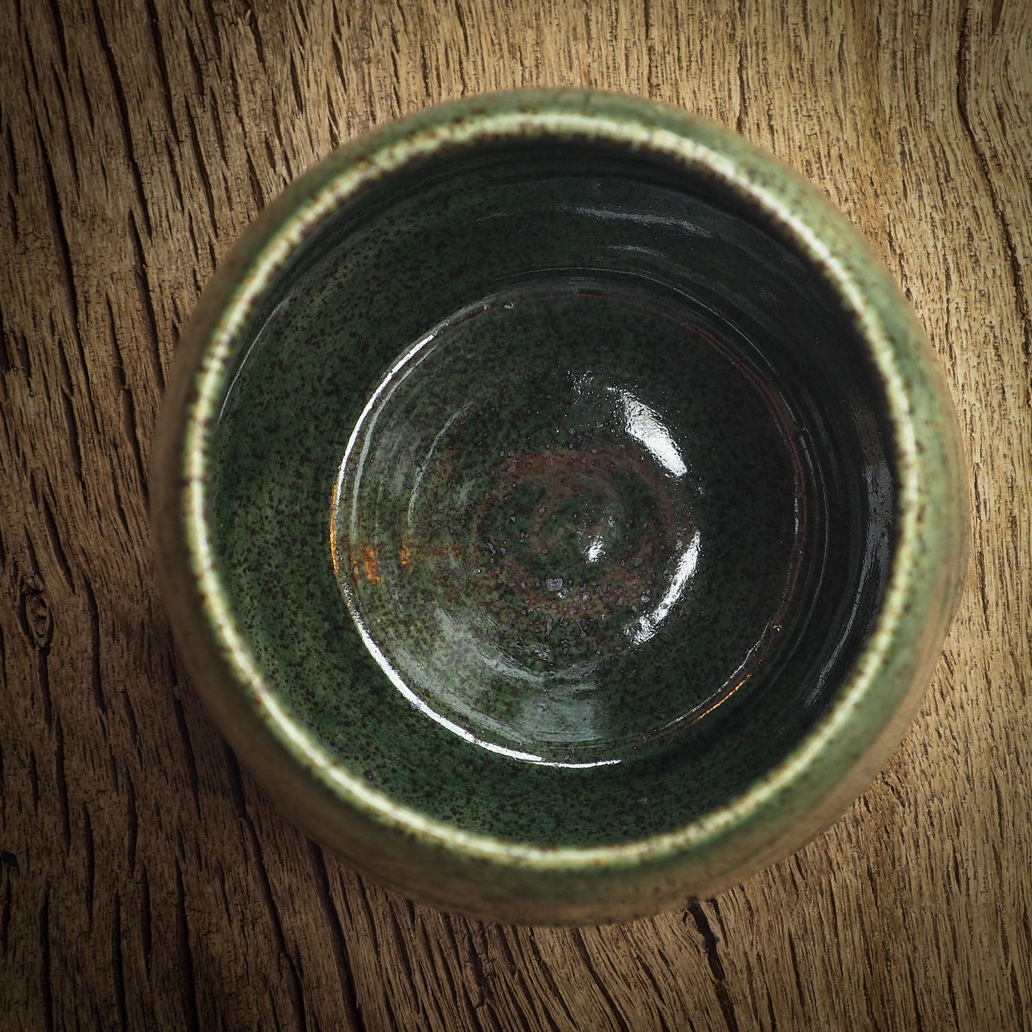 An original glazed ceramic jar by Idania Salcido, the artist behind Danita Art. It measures 2.5 x 2.5 x 3.5 Inches, with deep green hue glazes and hand decorated figures on the sides. Totally handmade in my studio, this is a unique piece that cannot be repeated. Food and drink safe, hand wash only.
