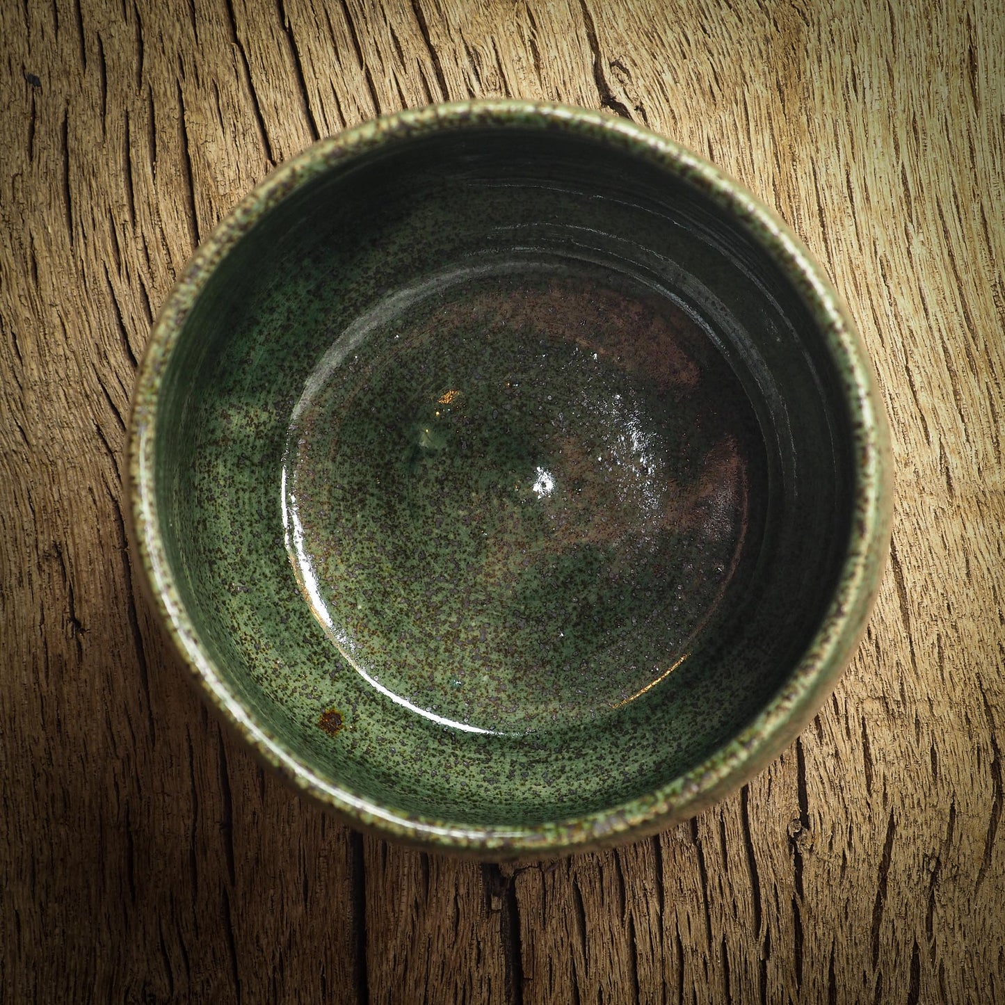 An original glazed ceramic jar by Idania Salcido, the artist behind Danita Art. It measures 3 x 3 x 3 Inches, with deep green hue glazes and hand decorated figures on the sides. Totally handmade in my studio, this is a unique piece that cannot be repeated. Food and drink safe, hand wash only.