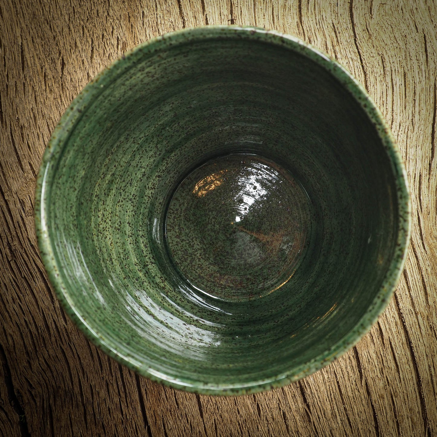 An original glazed ceramic mug by Idania Salcido, the artist behind Danita Art. It measures 4 x 4 x 3.5 Inches, with deep green hue glazes and hand decorated figures on the sides. Totally handmade in my studio, this is a unique piece that cannot be repeated. Food and drink safe, hand wash only.