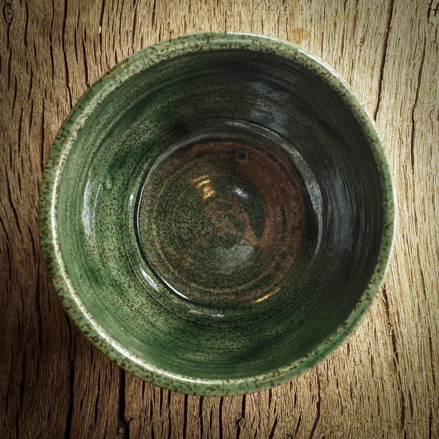 An original glazed ceramic mug by Idania Salcido, the artist behind Danita Art. It measures 4 x 4 x 3 Inches, with deep green hue glazes and hand decorated figures on the sides. Totally handmade in my studio, this is a unique piece that cannot be repeated. Food and drink safe, hand wash only.