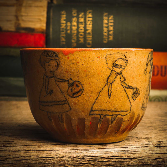 Remember when Idania Salcido (Danita Art) used to paint parades for each holiday? Now I'm making my first ceramic parade! Seven witches are parading on this handmade ceramic bowl, asking for treats as the go door by door in their neighborhood on the Halloween tradition of putting on costumes and going trick-or-treat. Don't you love it?