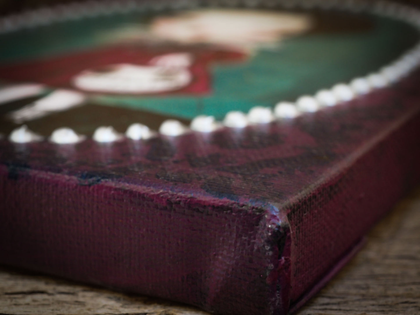 A little ghoul girl painted by Danita. She is ready to go trick-or-treat on Halloween night with her friends the ghosts, the witches, the werewolves and the monsters. Danita painted her while walking out of her door using acrylic and collage mixed media techniques. She has a pale skin face, but she still has those beautiful Danita eyes that you love.