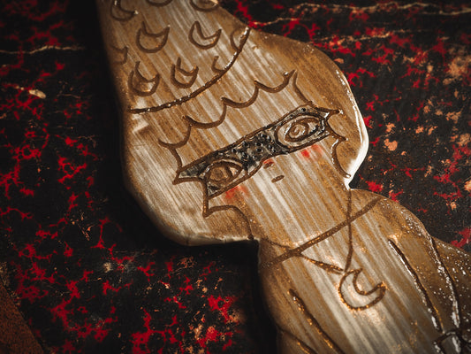 An original handmade Halloween ornament by Idania Salcido, Danita Art. Each ornament is hand carved with pumpkins, witches, cats, jack-o-lanterns and moons. Made with fired glazed ceramics, this little witch, jack-o-lantern and cat is carved with delicate patterns that make each ornament a one of a kind work of art.