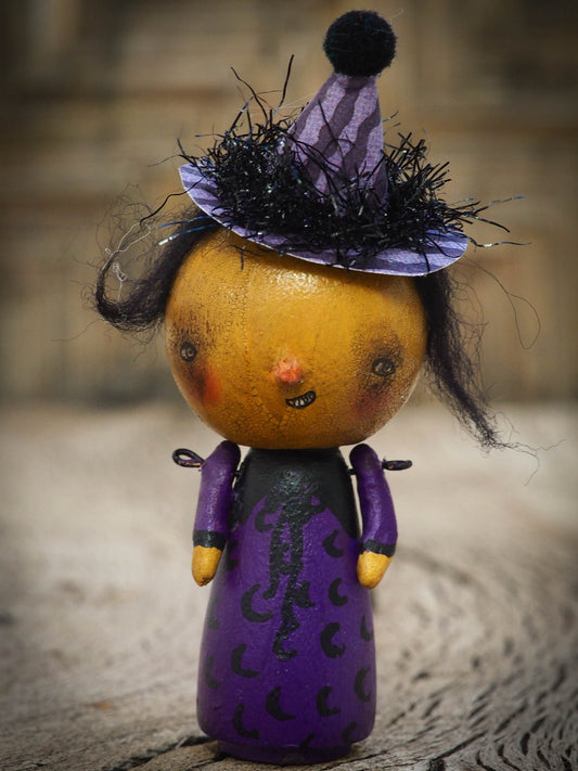 Folk art whimsical halloween witch mini kokeshi wooden style art dolls, designed and hand painted by non other that Danita Art, with painted body and wizard and witch clothes, adorable hand sculpted noses and a beautiful face with a whimsical smile. They come with a coffin shaped display and storage case for home decor