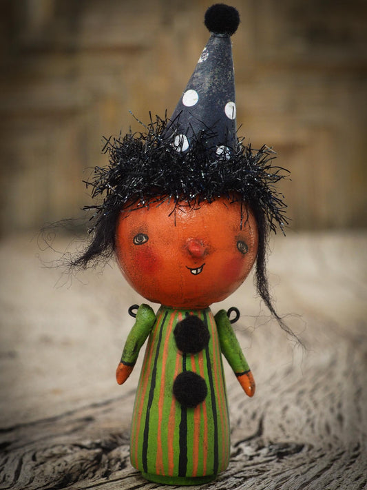 Folk art whimsical halloween witch mini kokeshi wooden style art dolls, designed and hand painted by non other that Danita Art, with painted body and wizard and witch clothes, adorable hand sculpted noses and a beautiful face with a whimsical smile. They come with a coffin shaped display and storage case for home decor