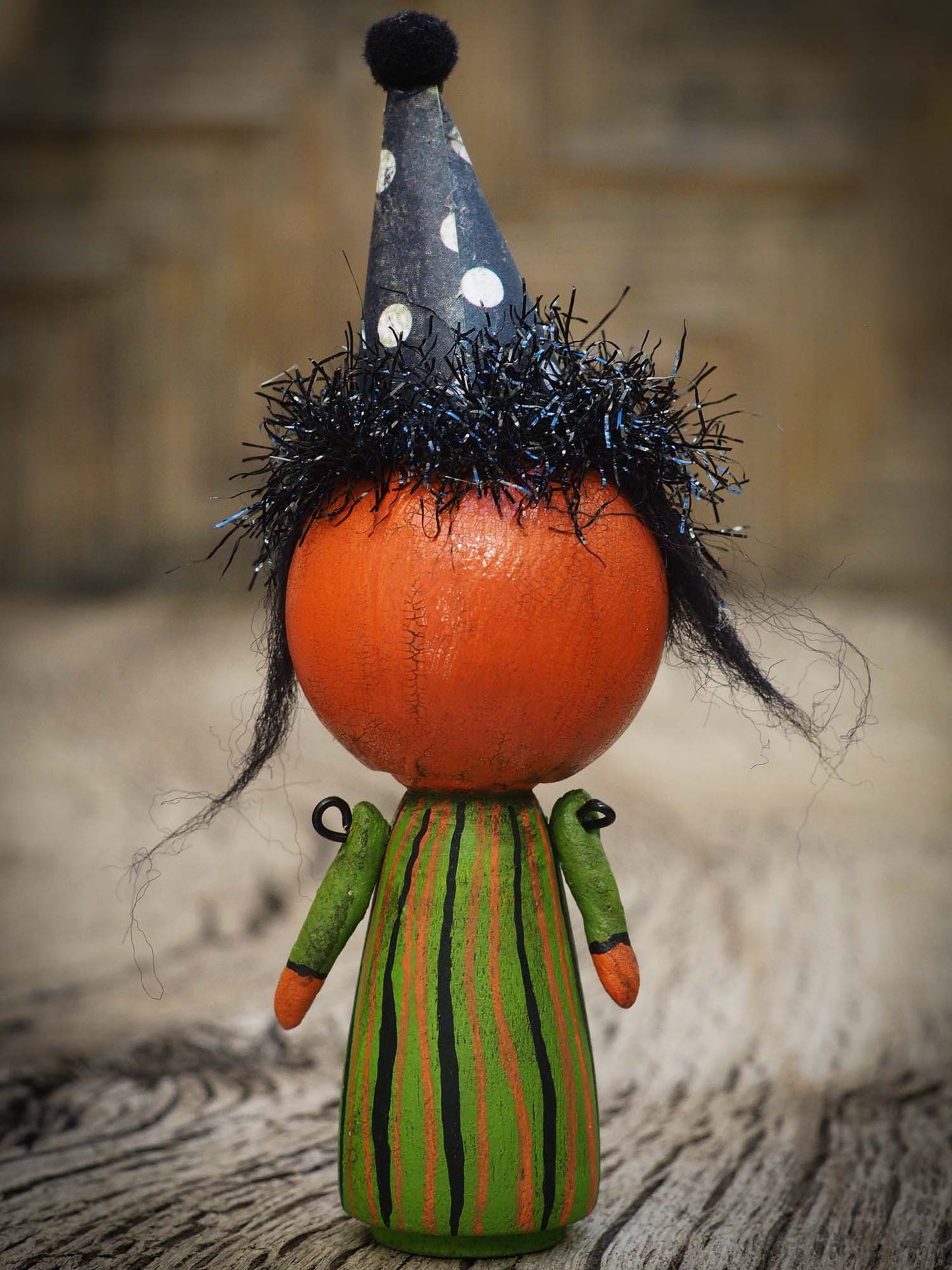 Folk art whimsical halloween witch mini kokeshi wooden style art dolls, designed and hand painted by non other that Danita Art, with painted body and wizard and witch clothes, adorable hand sculpted noses and a beautiful face with a whimsical smile. They come with a coffin shaped display and storage case for home decor