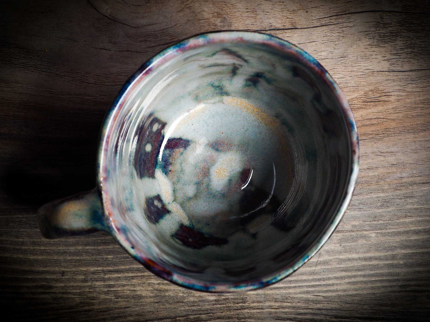 An original Halloween ceramic mug tumbler bowl handmade by Idania Salcido the artist behind Danita Art. Made with wheel thrown clay hand carved and glazed by the artist. Witches, ghosts, goblins, black cats, vampires give a folk art primitive feel to it. Perfect for Halloween Candy, ice cream and fruit, a pet cat bowl.