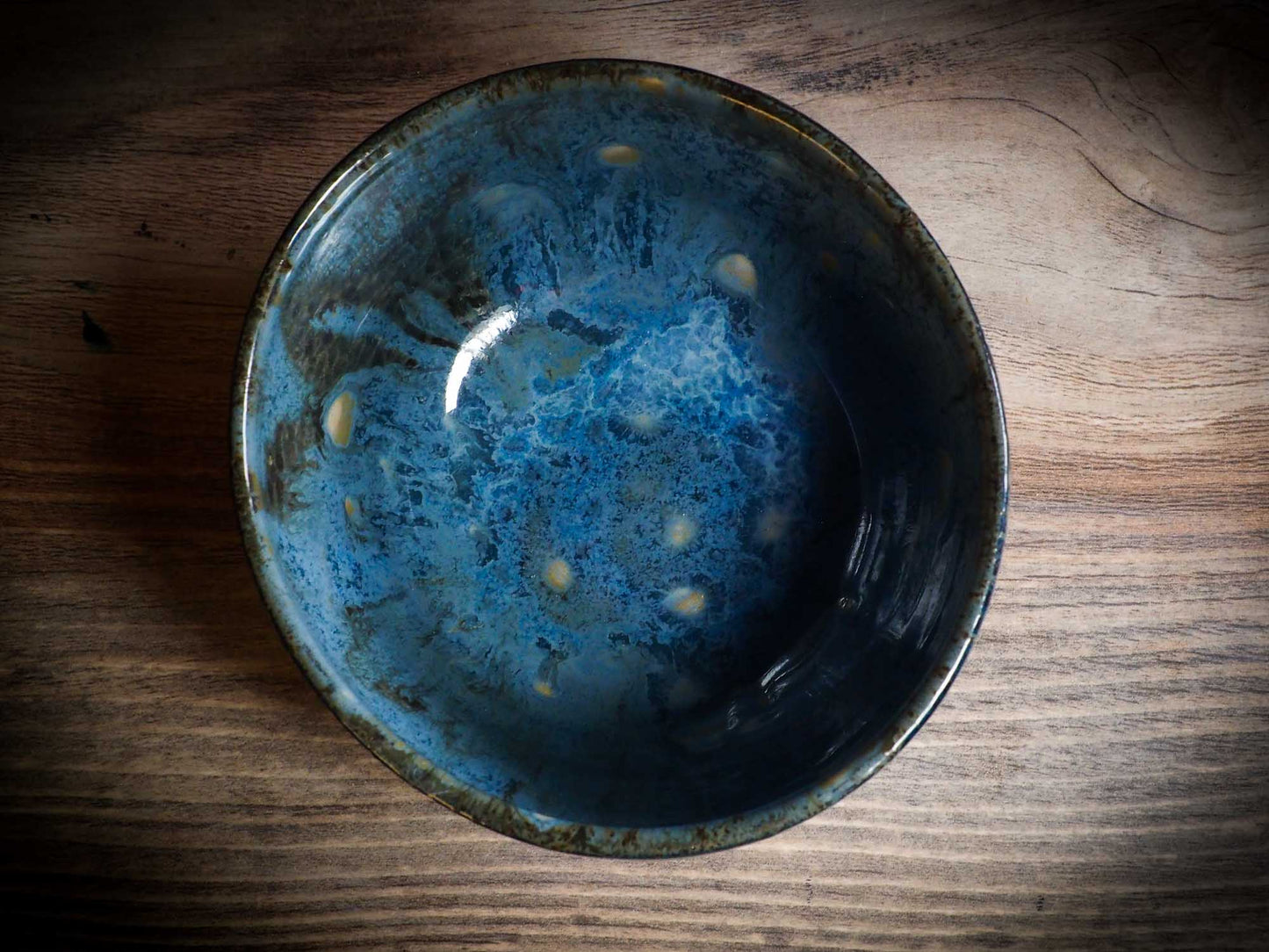 An original Halloween ceramic mug tumbler bowl handmade by Idania Salcido the artist behind Danita Art. Made with wheel thrown clay hand carved and glazed by the artist. Witches, ghosts, goblins, black cats, vampires give a folk art primitive feel to it. Perfect for Halloween Candy, ice cream and fruit, a pet cat bowl.