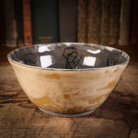 This original handmade Halloween themed glazed ceramic bowl by Idania Salcido, the artist behind Danita Art, features six little Halloween witch faery girls dancing around a cat as they go trick-or-treat on the best holiday of the year. Halloween! You can enjoy your favorite fruits and nuts in it, or maybe a little ice cream ball. Or you can use it to enjoy the candy treasure after going door to door.