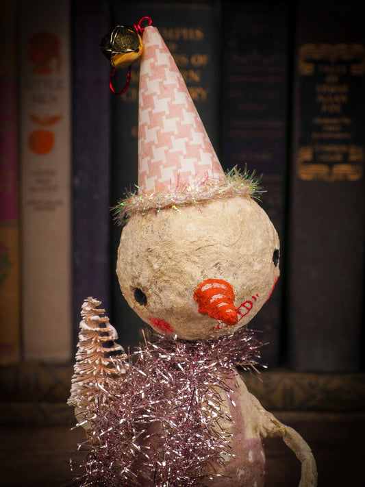 Adorable handmade spun cotton Art Doll Christmas tree ornament by Idania Salcido, the artist by Danita Art. Hand painted by the artist holiday figurine with paper hat with tinsel and vintage style garlands and a tiny Christmas tree. Hang this handmade ornament from your Christmas tree or use as Holiday decoration.