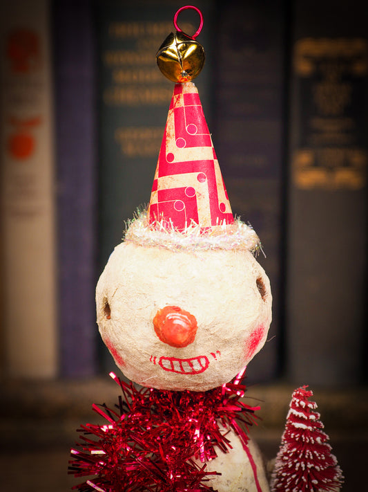 Adorable handmade spun cotton Art Doll Christmas tree ornament by Idania Salcido, the artist by Danita Art. Hand painted by the artist holiday figurine with paper hat with tinsel and vintage style garlands and a tiny Christmas tree. Hang this handmade ornament from your Christmas tree or use as Holiday decoration.