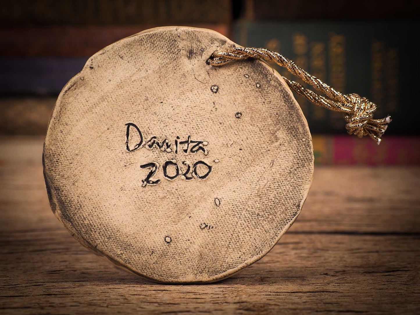 An original Christmas Holiday tree round glazed ceramic ornament handmade by Idania Salcido, the artist behind Danita Art. Glazed carved sgraffito stoneware, hand painted and decorated, it is illustrated by hand with winter scenes with snowmen, Christmas trees, Santa Claus, snow balls and winter themes.