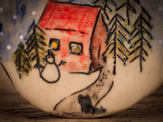An original Christmas Holiday tree round glazed ceramic ornament handmade by Idania Salcido, the artist behind Danita Art. Glazed carved sgraffito stoneware, hand painted and decorated, it is illustrated by hand with winter scenes with snowmen, Christmas trees, Santa Claus, snow balls and winter themes.