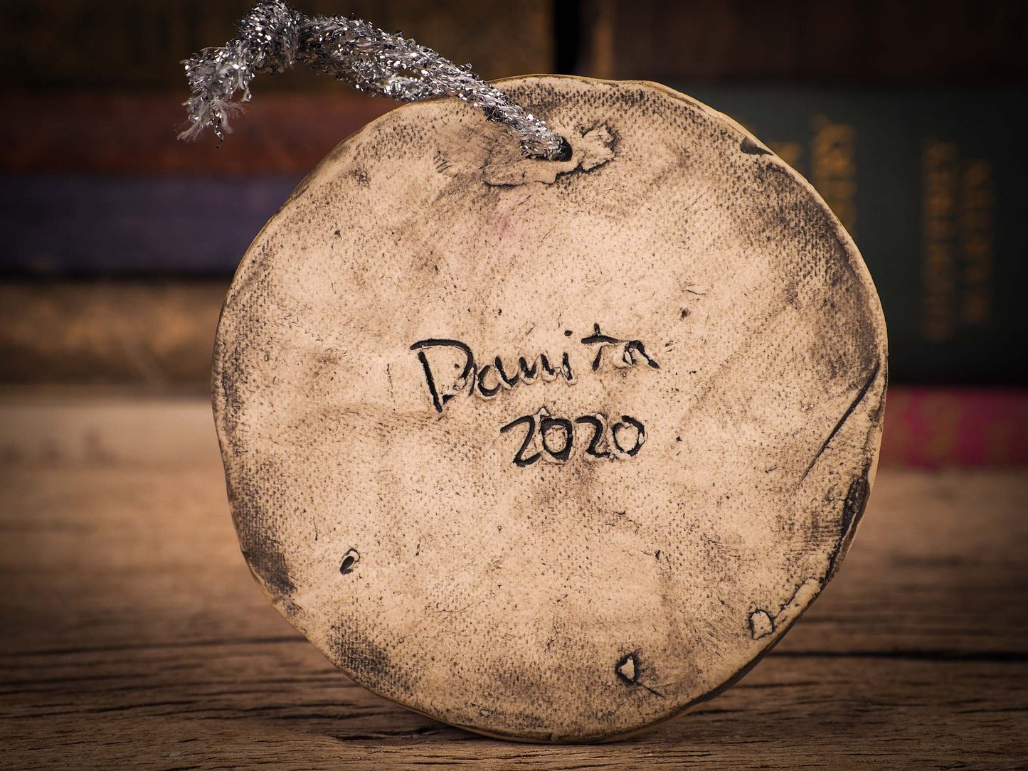 An original Christmas Holiday tree round glazed ceramic ornament handmade by Idania Salcido, the artist behind Danita Art. Glazed carved sgraffito stoneware, hand painted and decorated, it is illustrated by hand with winter scenes with snowmen, Christmas trees, Santa Claus, snow balls and winter themes.