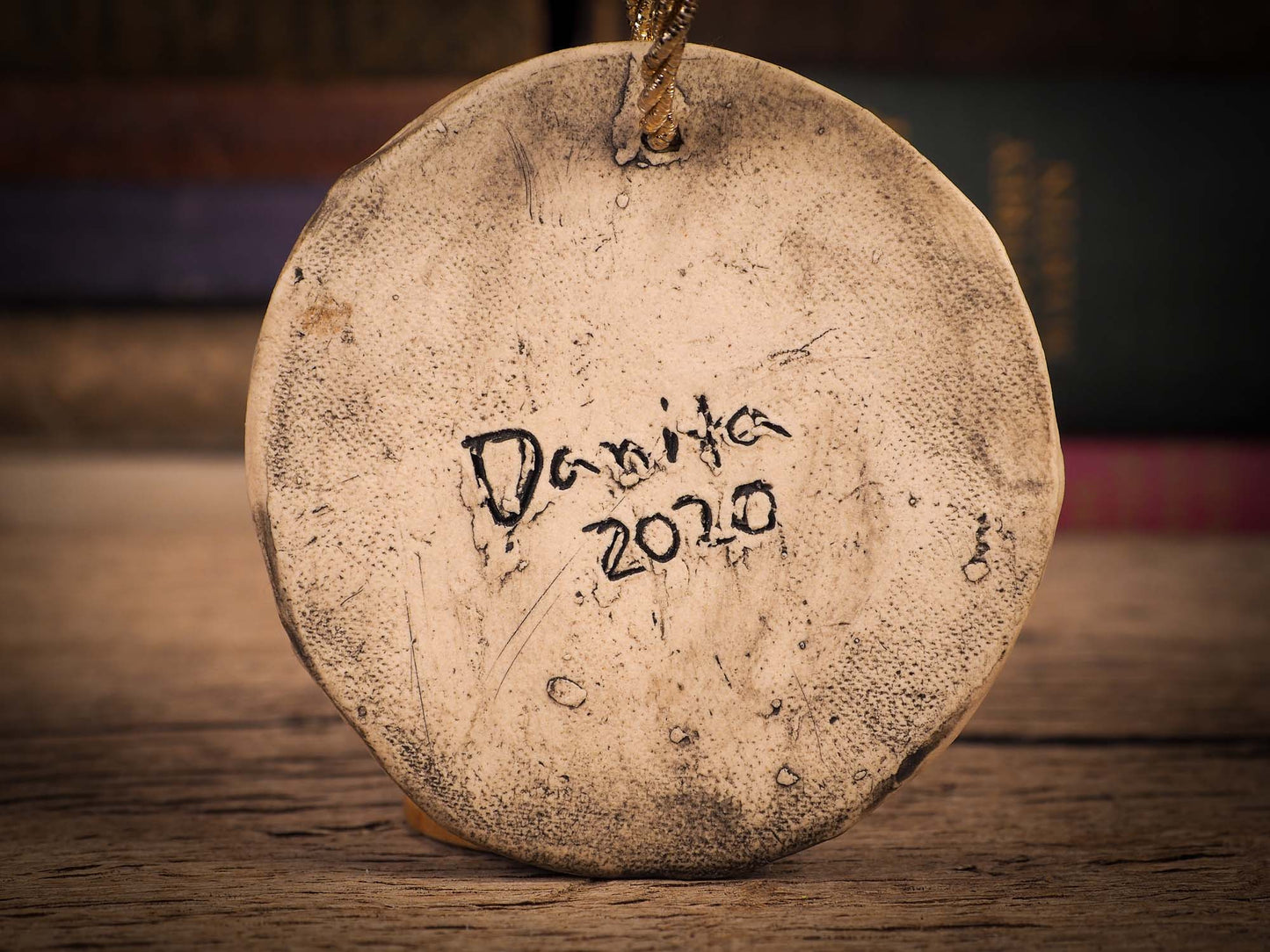 An original Christmas Holiday tree round glazed ceramic ornament handmade by Idania Salcido, the artist behind Danita Art. Glazed carved sgraffito stoneware, hand painted and decorated, it is illustrated by hand with winter scenes with snowmen, Christmas trees, Santa Claus, snow balls and winter themes.