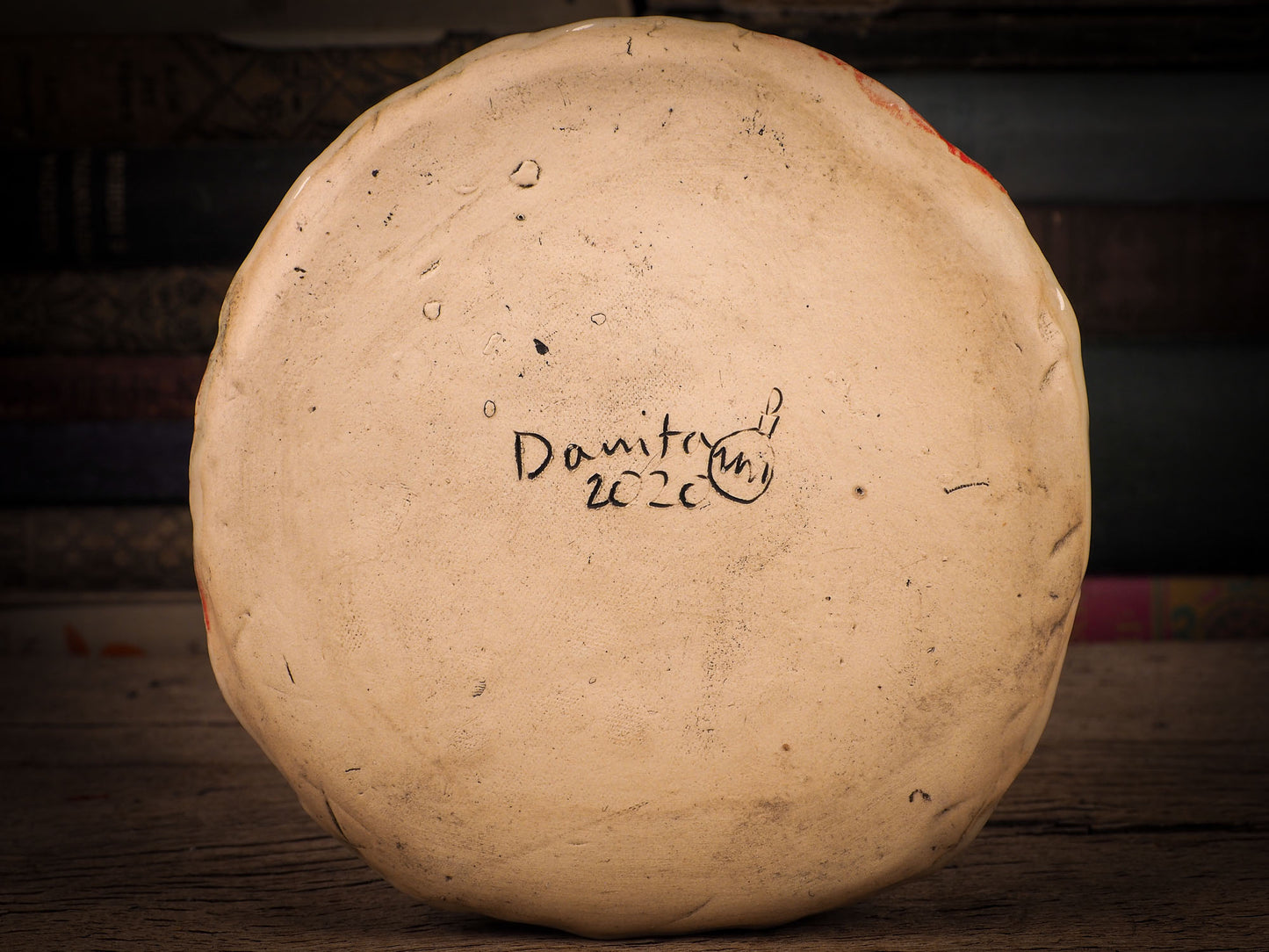 An original Christmas Holiday cake dinner dessert plate round glazed ceramic dinnerware handmade by Idania Salcido, the artist behind Danita Art. Glazed carved sgraffito stoneware, hand painted and decorated, it is illustrated by hand with snowmen, Christmas trees, Santa Claus, angels and snow balls and winter themes.