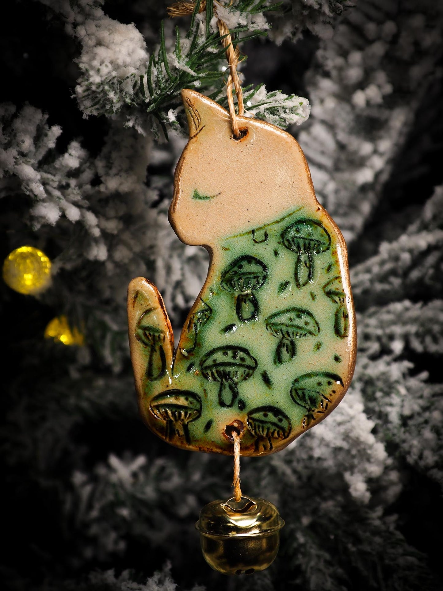 An original Christmas Holiday tree round glazed ceramic ornament handmade by Idania Salcido, the artist behind Danita Art. Glazed carved sgraffito stoneware, hand painted and decorated, it is illustrated by hand with snowmen, Christmas trees, Santa Claus, angels and snow balls and winter themes.