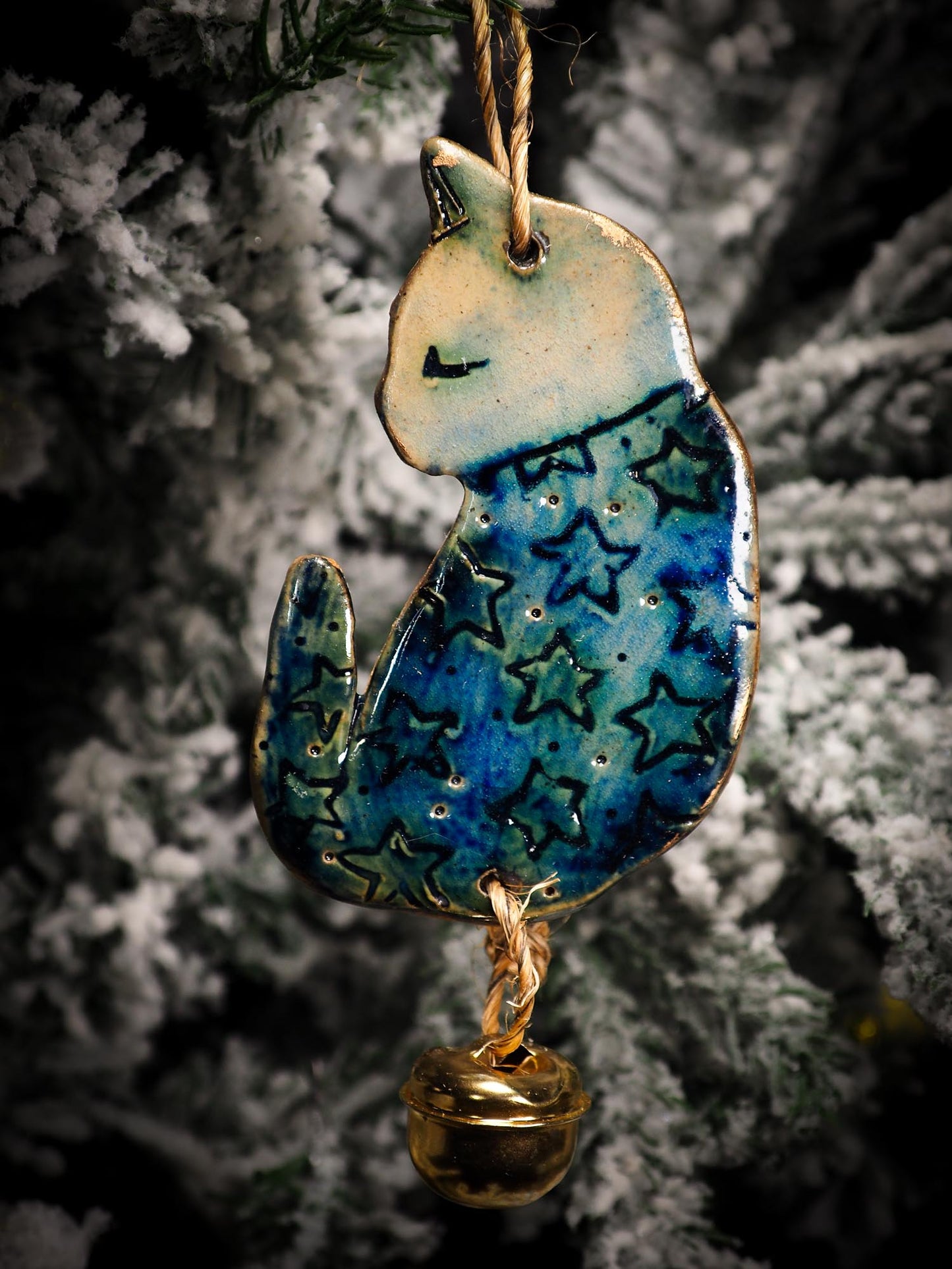 An original Christmas Holiday tree round glazed ceramic ornament handmade by Idania Salcido, the artist behind Danita Art. Glazed carved sgraffito stoneware, hand painted and decorated, it is illustrated by hand with snowmen, Christmas trees, Santa Claus, angels and snow balls and winter themes.