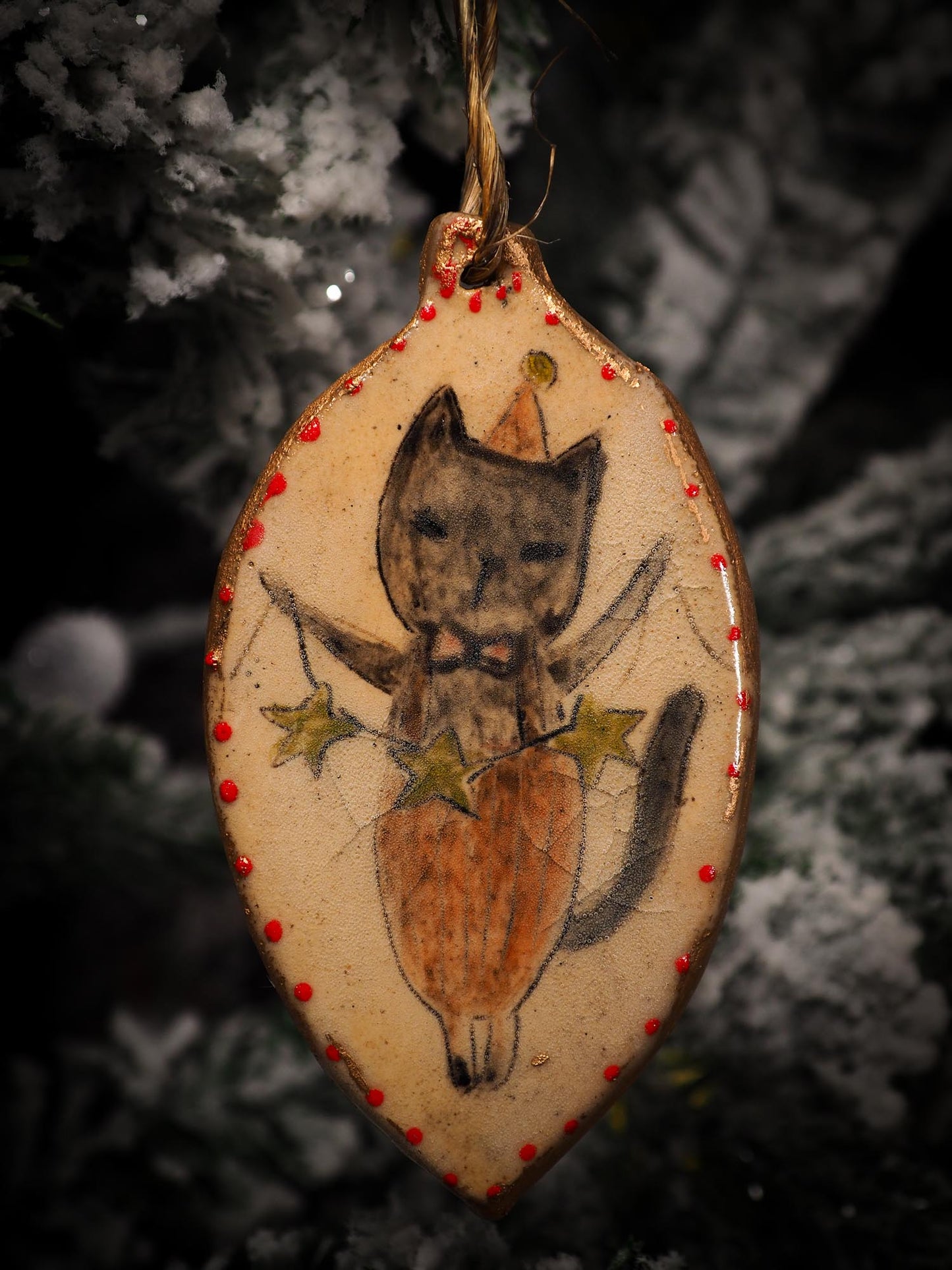 An original Christmas Holiday tree round glazed ceramic ornament handmade by Idania Salcido, the artist behind Danita Art. Glazed carved sgraffito stoneware, hand painted and decorated, it is illustrated by hand with snowmen, Christmas trees, Santa Claus, angels and snow balls and winter themes.