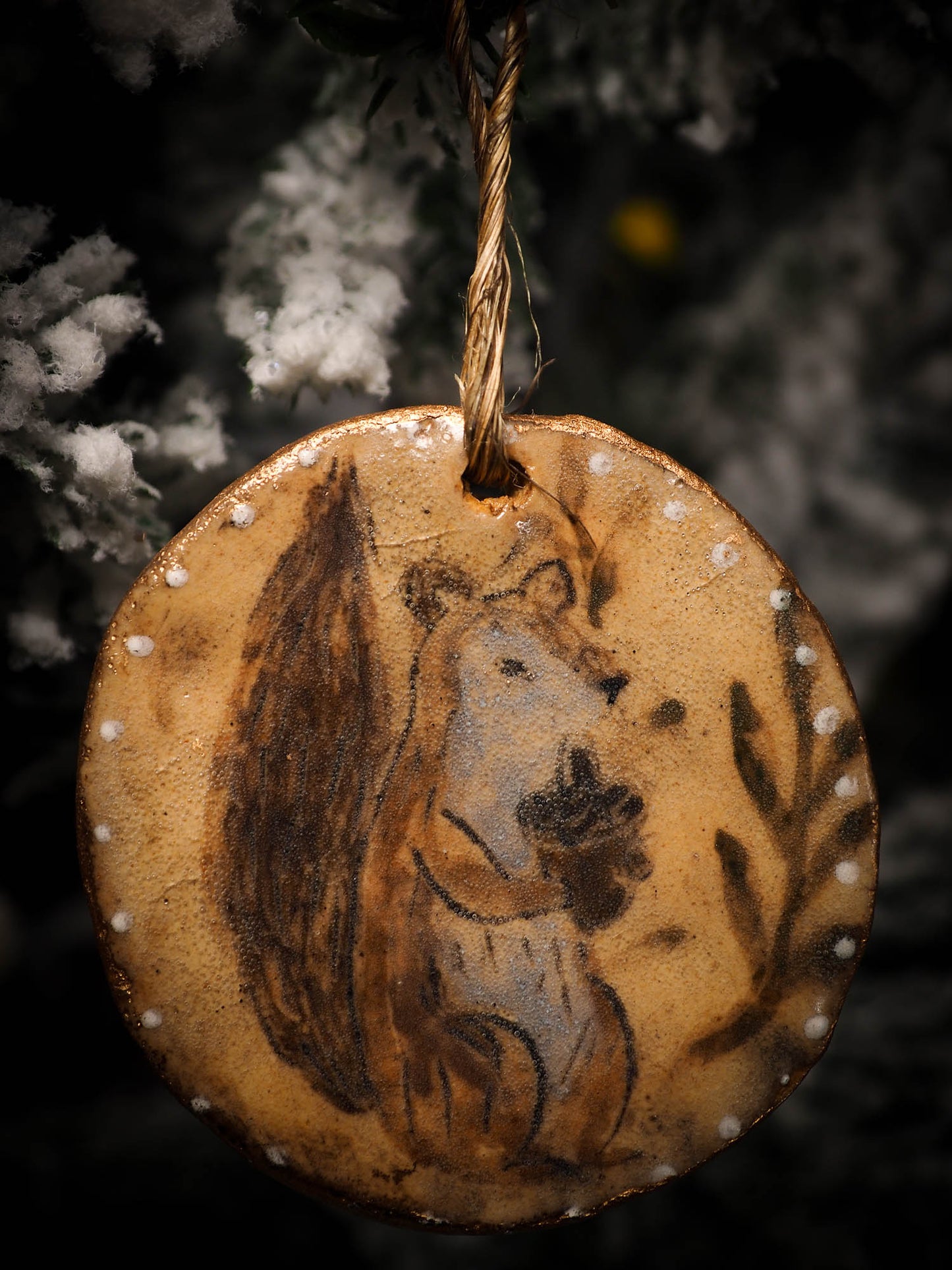 An original Christmas Holiday tree round glazed ceramic ornament handmade by Idania Salcido, the artist behind Danita Art. Glazed carved sgraffito stoneware, hand painted and decorated, it is illustrated by hand with snowmen, Christmas trees, Santa Claus, angels and snow balls and winter themes.