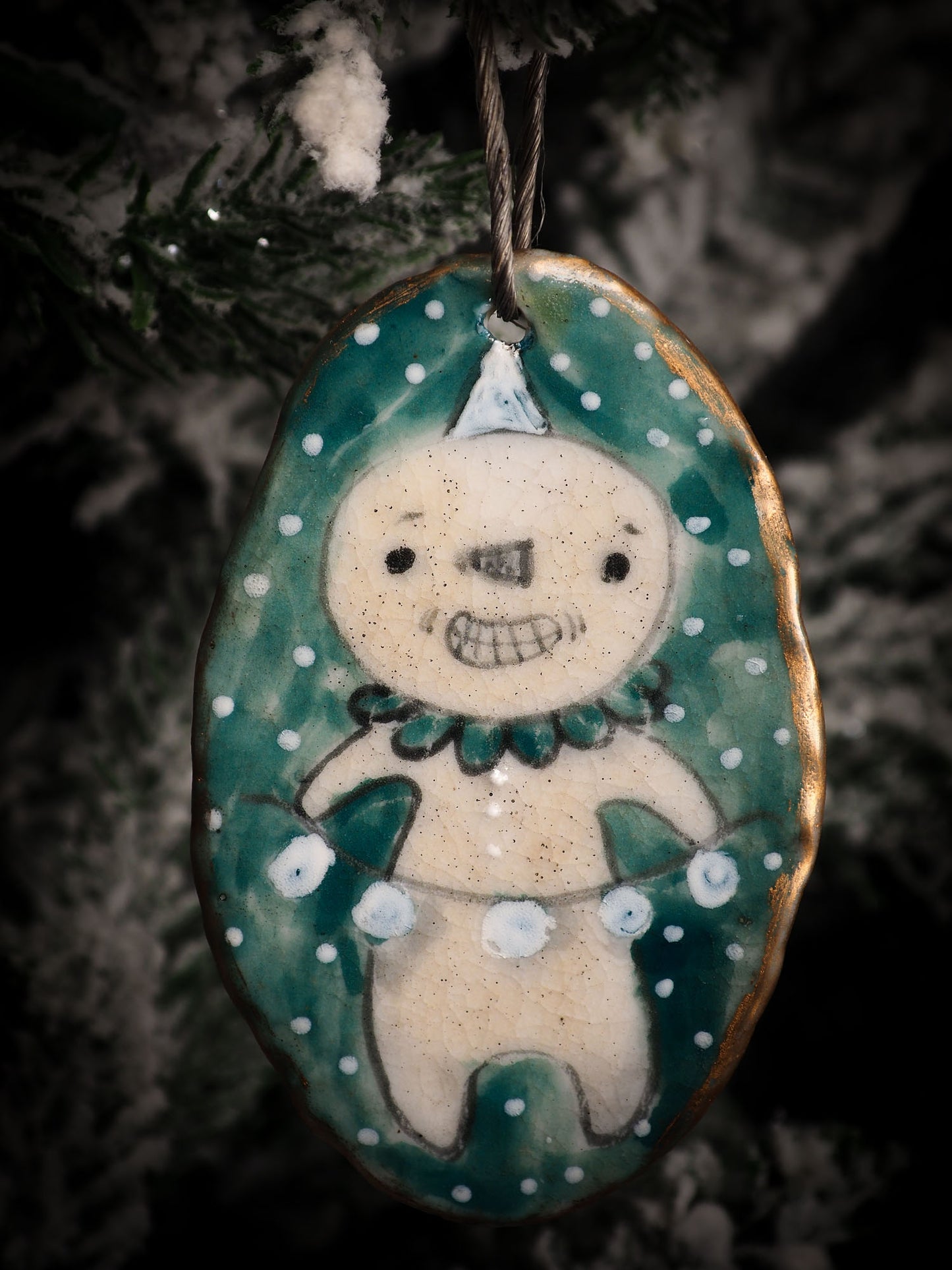 An original Christmas Holiday tree round glazed ceramic ornament handmade by Idania Salcido, the artist behind Danita Art. Glazed carved sgraffito stoneware, hand painted and decorated, it is illustrated by hand with snowmen, Christmas trees, Santa Claus, angels and snow balls and winter themes.