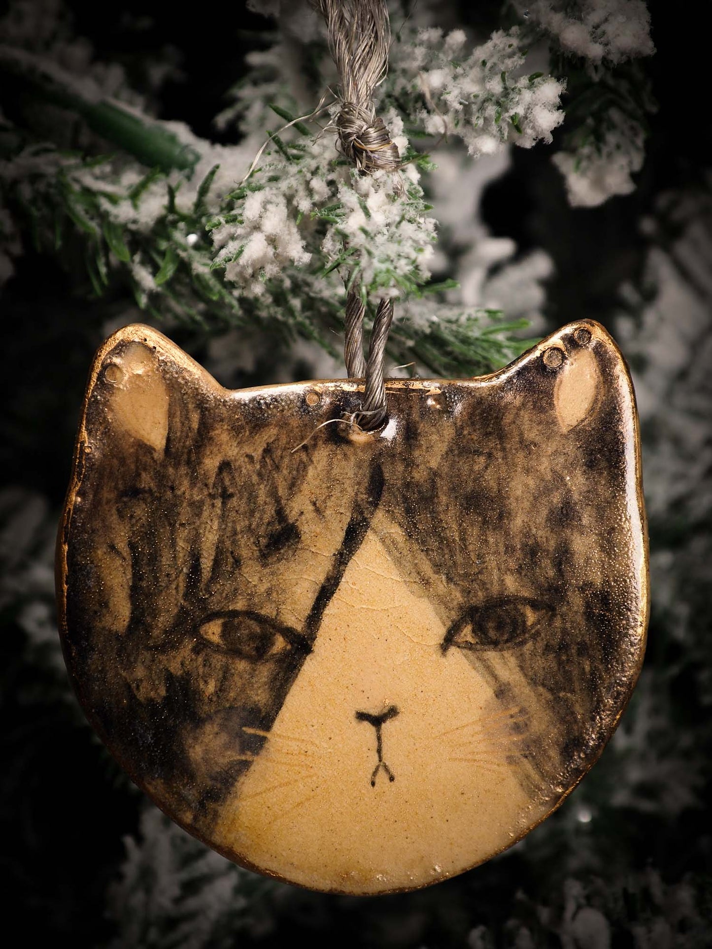 An original Christmas Holiday tree round glazed ceramic ornament handmade by Idania Salcido, the artist behind Danita Art. Glazed carved sgraffito stoneware, hand painted and decorated, it is illustrated by hand with snowmen, Christmas trees, Santa Claus, angels and snow balls and winter themes.