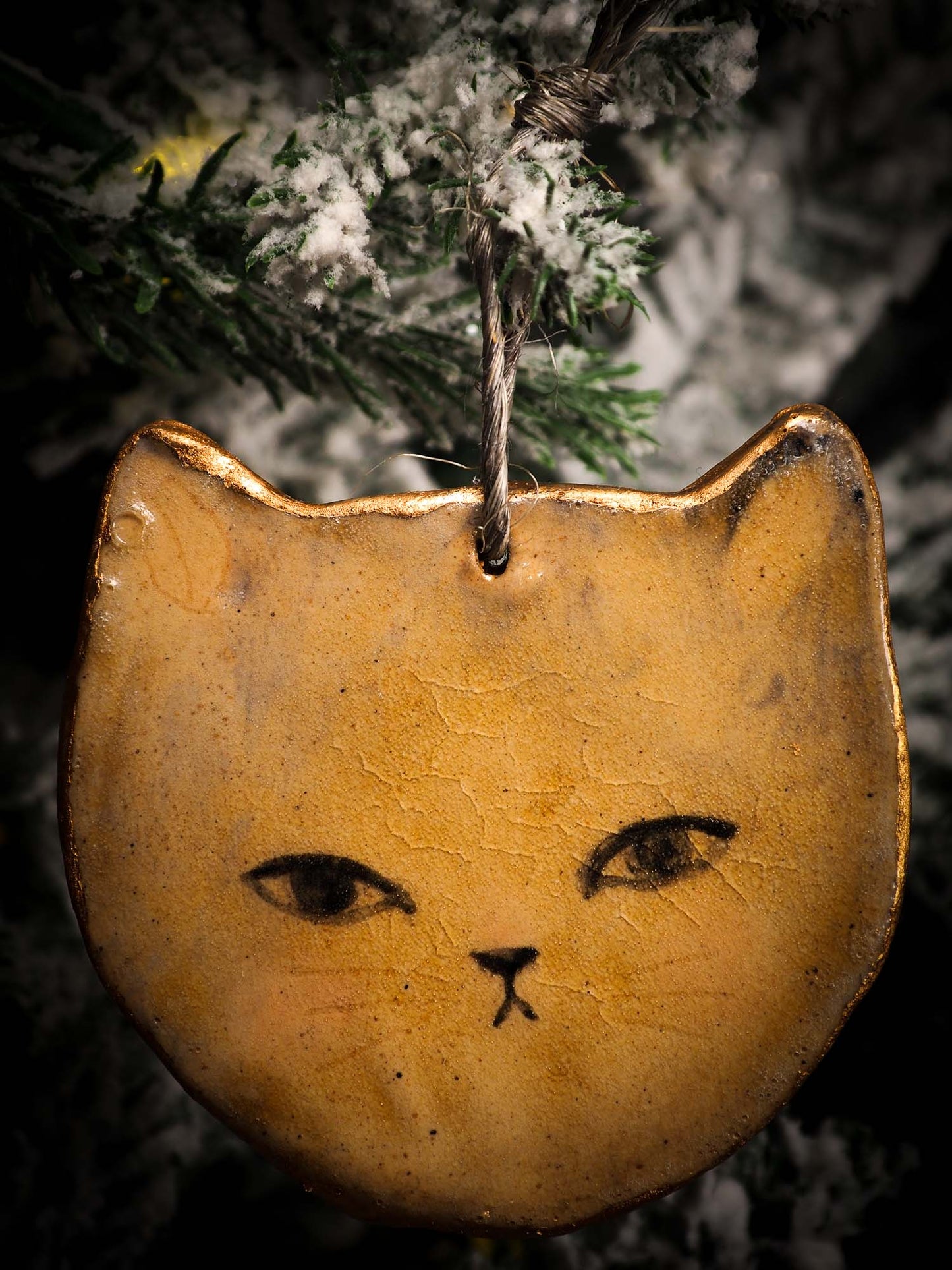 An original Christmas Holiday tree round glazed ceramic ornament handmade by Idania Salcido, the artist behind Danita Art. Glazed carved sgraffito stoneware, hand painted and decorated, it is illustrated by hand with snowmen, Christmas trees, Santa Claus, angels and snow balls and winter themes.