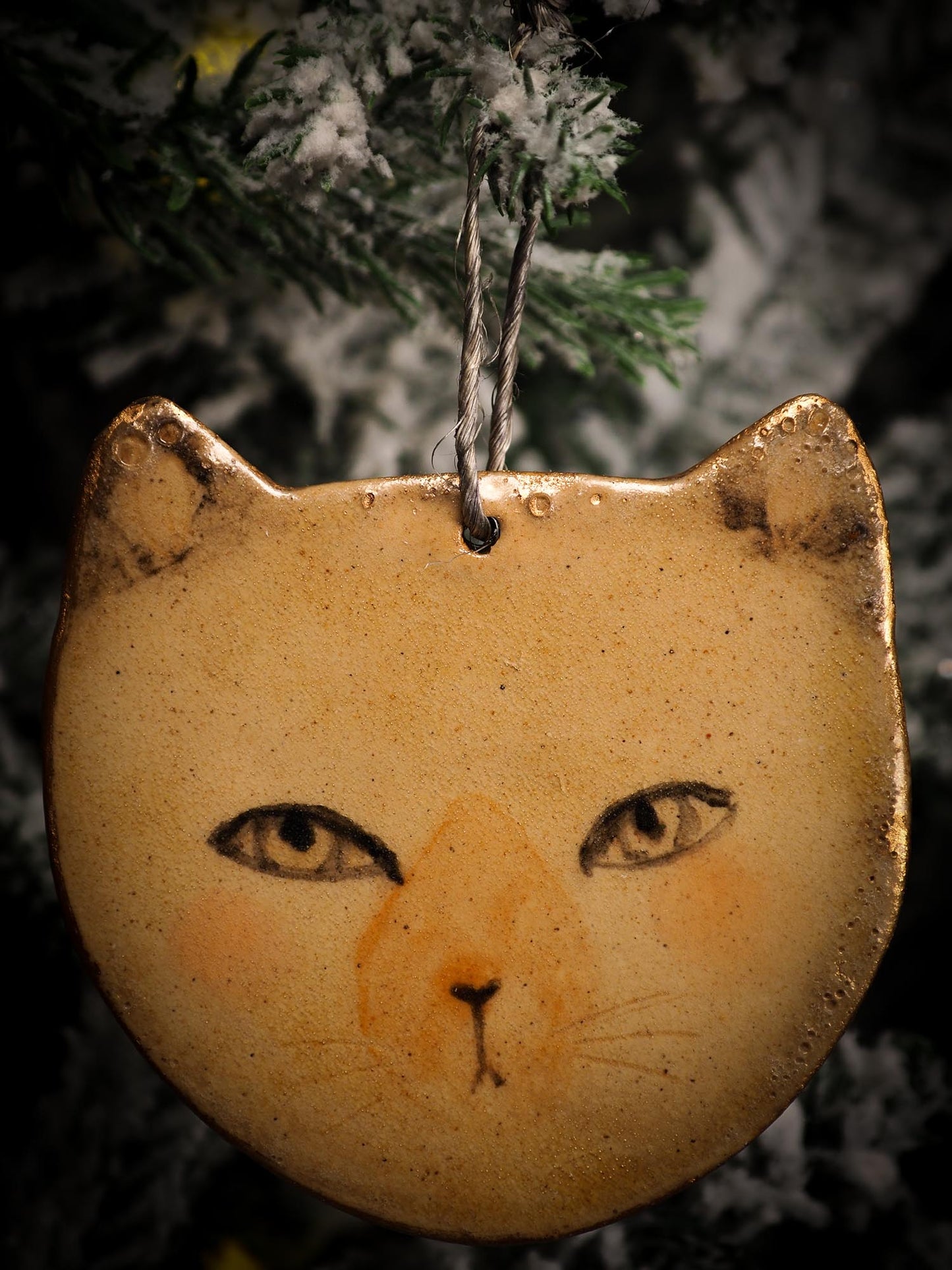 An original Christmas Holiday tree round glazed ceramic ornament handmade by Idania Salcido, the artist behind Danita Art. Glazed carved sgraffito stoneware, hand painted and decorated, it is illustrated by hand with snowmen, Christmas trees, Santa Claus, angels and snow balls and winter themes.