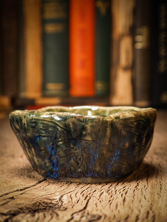 An original Christmas fire glazed ceramic handmade piece by Idania Salcido, the artist behind Danita Art. Glazed, carved sgraffito stoneware, hand painted and decorated, it is illustrated by hand with snowmen, Christmas trees, Santa Claus, angels and snow balls and winter themes.