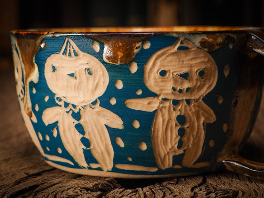 An original Christmas fire glazed ceramic handmade piece by Idania Salcido, the artist behind Danita Art. Glazed, carved sgraffito stoneware, hand painted and decorated, it is illustrated by hand with snowmen, Christmas trees, Santa Claus, angels and snow balls and winter themes.