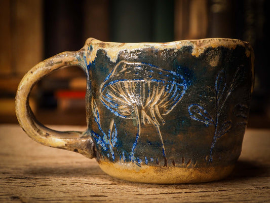 An original Christmas fire glazed ceramic handmade piece by Idania Salcido, the artist behind Danita Art. Glazed, carved sgraffito stoneware, hand painted and decorated, it is illustrated by hand with snowmen, Christmas trees, Santa Claus, angels and snow balls and winter themes.