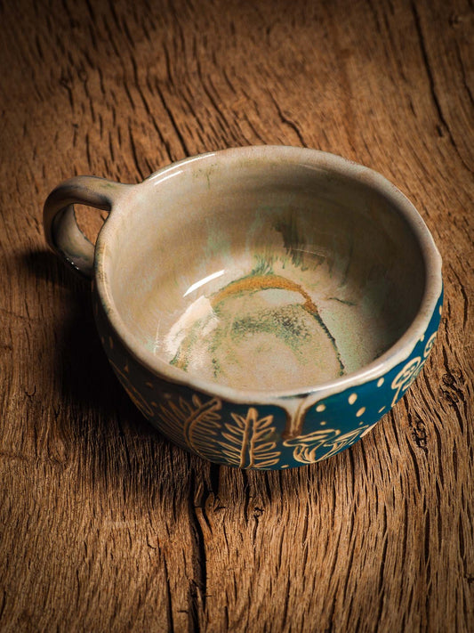 An original Christmas fire glazed ceramic handmade piece by Idania Salcido, the artist behind Danita Art. Glazed, carved sgraffito stoneware, hand painted and decorated, it is illustrated by hand with snowmen, Christmas trees, Santa Claus, angels and snow balls and winter themes.