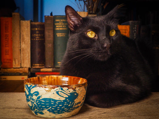 An original Christmas fire glazed ceramic handmade piece by Idania Salcido, the artist behind Danita Art. Glazed, carved sgraffito stoneware, hand painted and decorated, it is illustrated by hand with snowmen, Christmas trees, Santa Claus, angels and snow balls and winter themes.