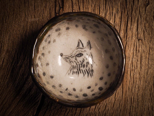 An original Christmas fire glazed ceramic handmade piece by Idania Salcido, the artist behind Danita Art. Glazed, carved sgraffito stoneware, hand painted and decorated, it is illustrated by hand with snowmen, Christmas trees, Santa Claus, angels and snow balls and winter themes.