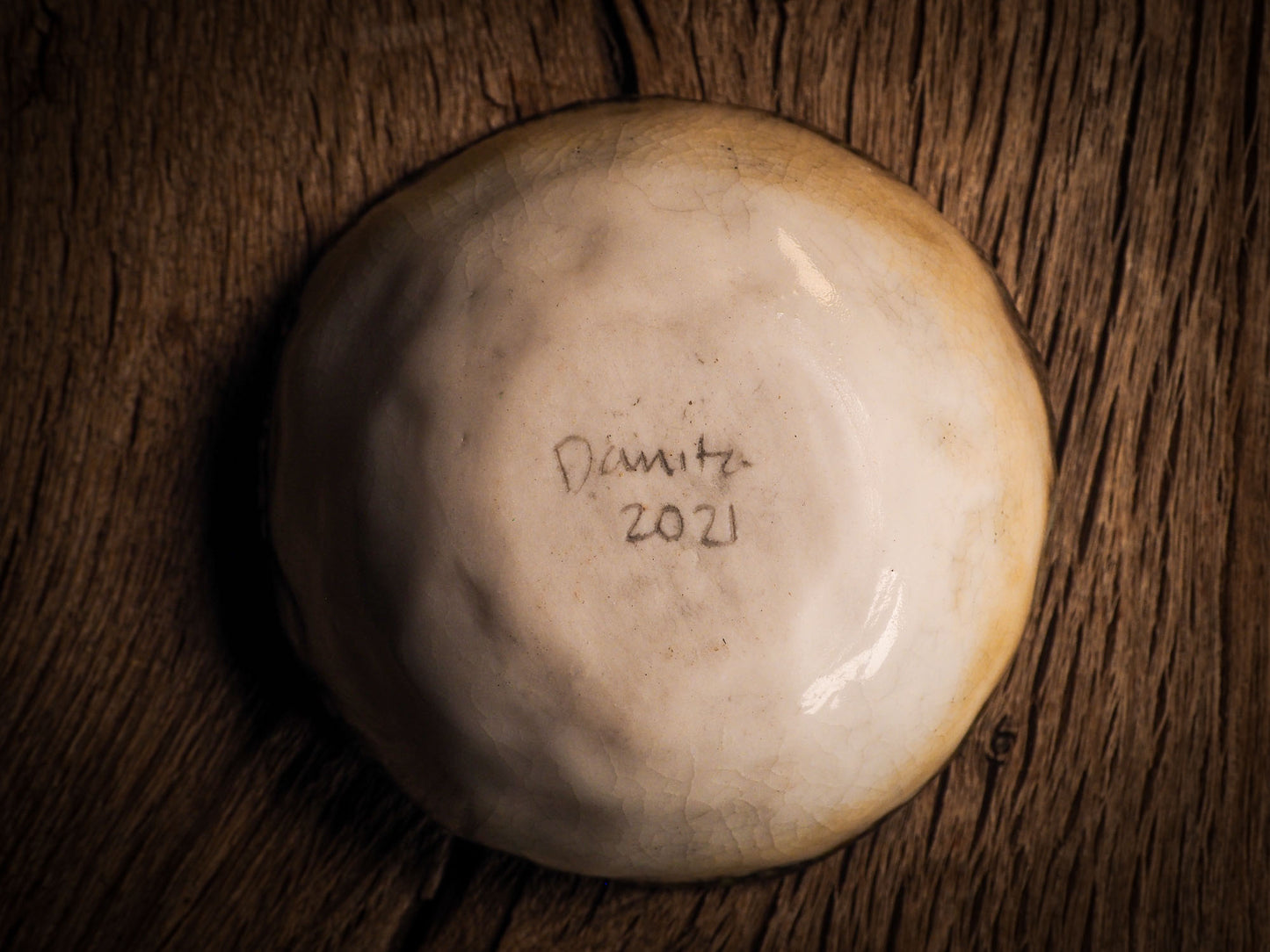 An original Christmas fire glazed ceramic handmade piece by Idania Salcido, the artist behind Danita Art. Glazed, carved sgraffito stoneware, hand painted and decorated, it is illustrated by hand with snowmen, Christmas trees, Santa Claus, angels and snow balls and winter themes.