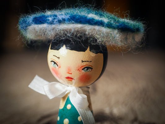 A beautiful collection of Mushroom dolls by Idania Salcido, the artist behind Danita Art. Each little wooden kokeshi doll is hand made by Danita Art with hand painted wood body, expressive and unique faces with a unique personality. Topped by a mushroom felted organic wool cap for a woodland feel to them.