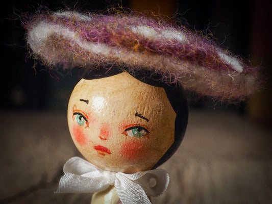 A beautiful collection of Mushroom dolls by Idania Salcido, the artist behind Danita Art. Each little wooden kokeshi doll is hand made by Danita Art with hand painted wood body, expressive and unique faces with a unique personality. Topped by a mushroom felted organic wool cap for a woodland feel to them.
