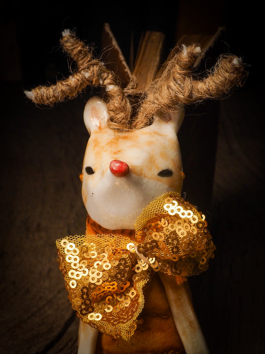 An adorable hand made porcelain and fabric fine art doll by Idania Salcido Danita Art. Perfect to hang as a delicate Christmas tree ornament, this fired ceramic mixed media artwork is unique. Each doll has a beautiful hand sculpted porcelain ceramic face and hand dyed fabric body with vintage accessories as home decor.