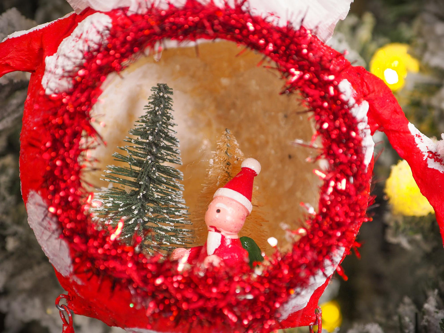 Adorable handmade spun cotton Art Doll Christmas tree ornament by Idania Salcido, the artist by Danita Art. Hand painted by the artist holiday figurine with paper hat with tinsel and vintage style garlands and a tiny Christmas tree. Hang this handmade ornament from your Christmas tree or use as Holiday decoration.